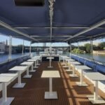 Sevilla: Paseo en barco + Comida o Cena de 5 platos + Bebidas ilimitadas